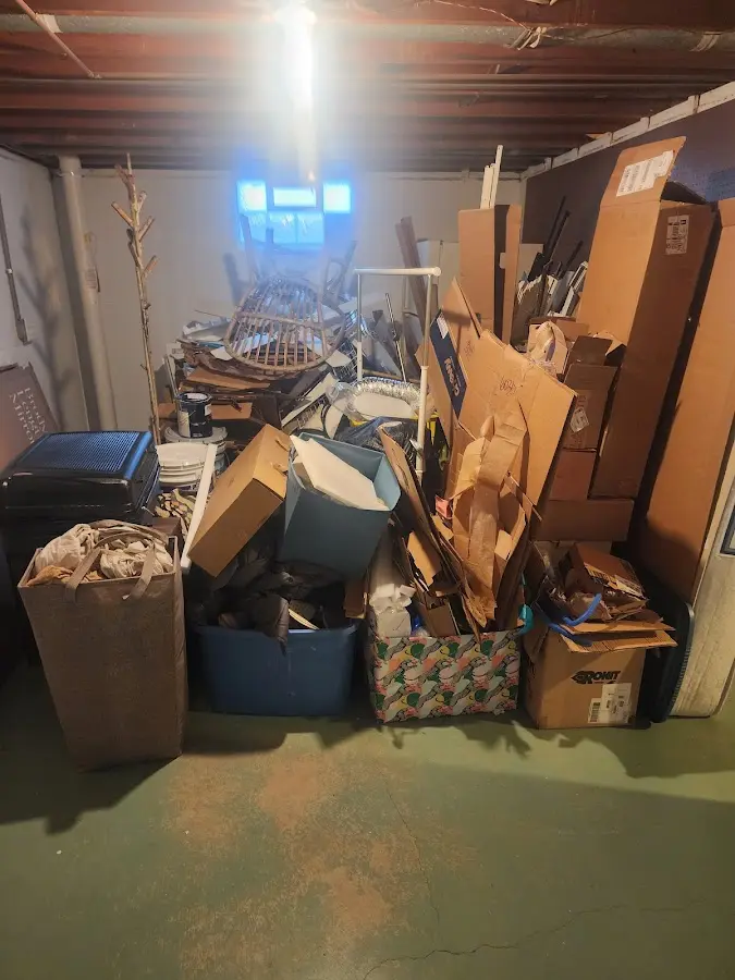 Roll-off dumpster container at job site for Yard Waste Dumpster Rental in Hondo